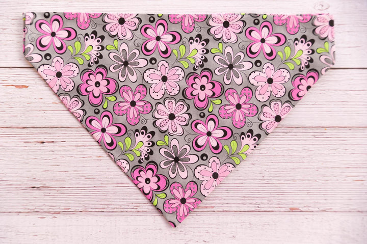 grey dog bandana with pink, white, green, black retro flowers